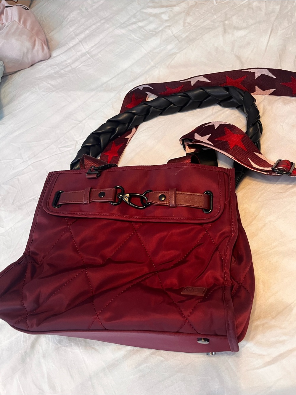 Quilted Burgundy Shoulder Bag with Braided Handle and Star-Print Strap